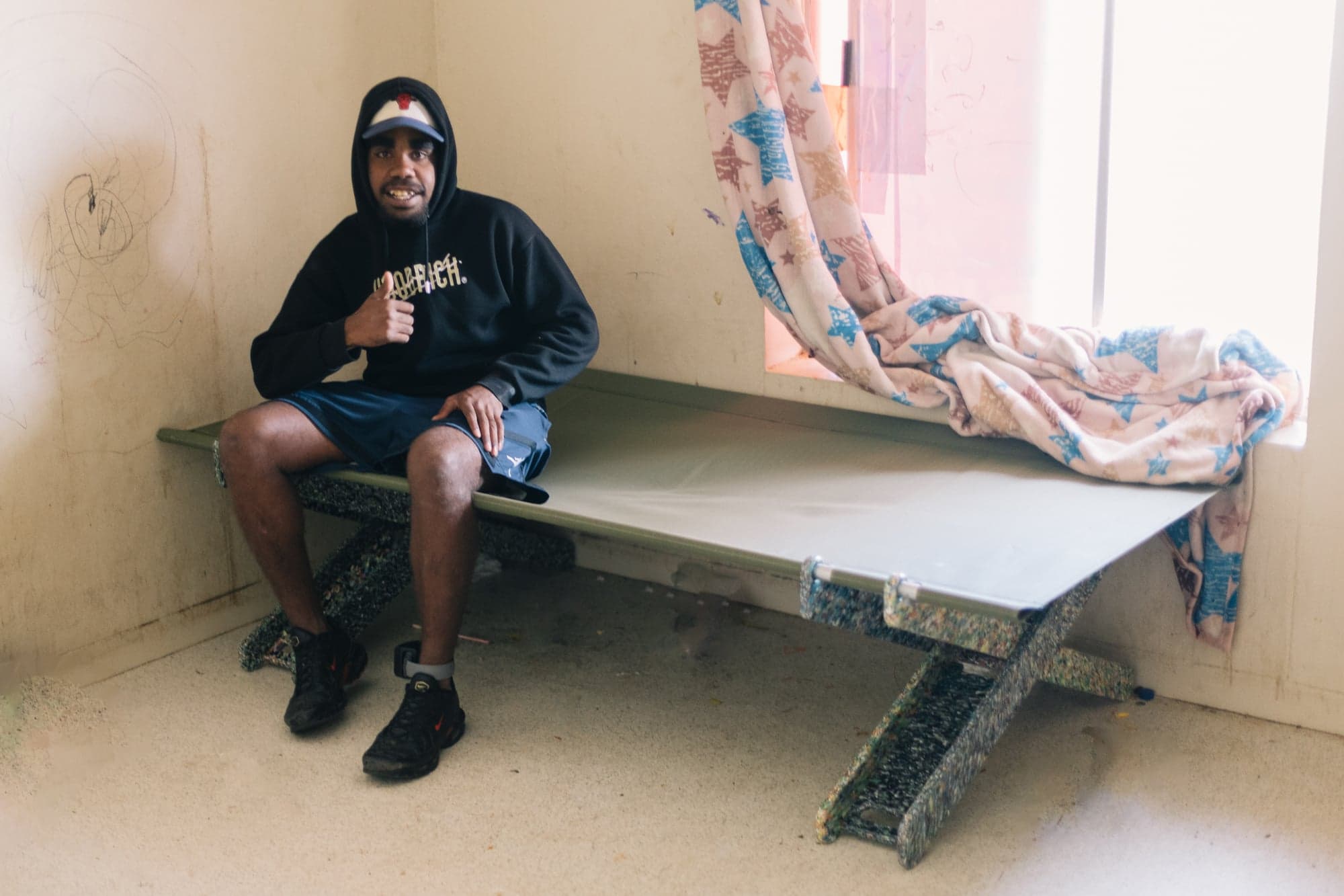 A young person with a Stretch Bed at the Alice Springs build